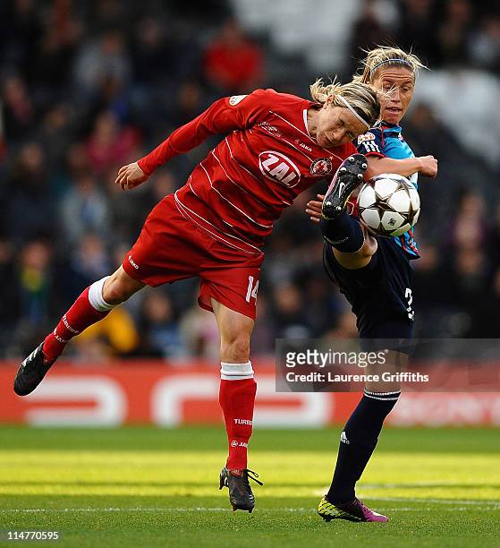 Camile Abily of Lyon battles with Jennifer Zietz of Turbine Potsdam during the UEFA Women's Champions League Final between Lyon and Turbine Potsdam...