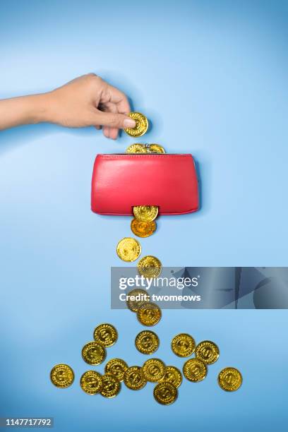 financial overspending concept image. - handtasche offen stock-fotos und bilder