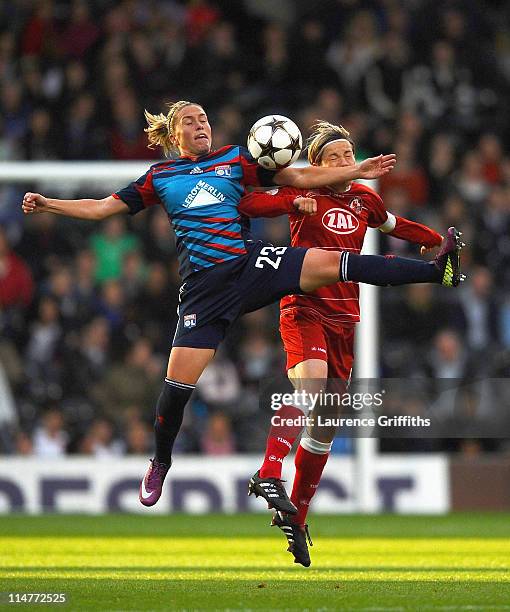 Camile Abily of Lyon battles with Jennifer Zietz of Turbine Potsdam during the UEFA Women's Champions League Final between Lyon and Turbine Potsdam...