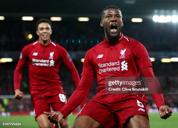 Georginio Wijnaldum of Liverpool celebrates after scoring his team's third goal with Trent Alexander-Arnold during the UEFA Champions League Semi...