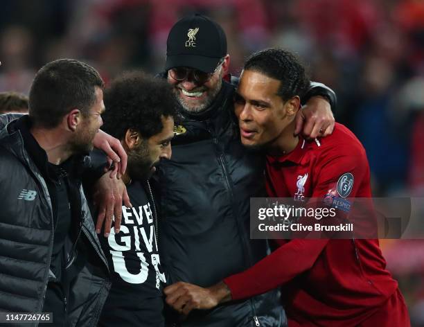 Jurgen Klopp, Manager of Liverpool, Mohamed Salah of Liverpool and Virgil van Dijk celebrate after the UEFA Champions League Semi Final second leg...