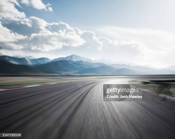 snow mountain road - motor racing track stock pictures, royalty-free photos & images