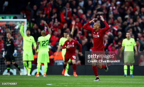 Fabinho of Liverpool celebrates to the crowd after his team mate Divock Origi has scored the first goal during the UEFA Champions League Semi Final...