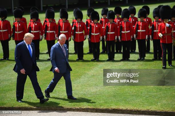 President Donald Trump and Prince Charles, Prince of Wales inspect the Guard of Honour during the Ceremonial Welcome at Buckingham Palace on the...