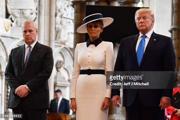 President Donald Trump and First Lady Melania Trump, alongside Prince Andrew, Duke of York pay their respects at the Tomb of the Unknown Warrior in...