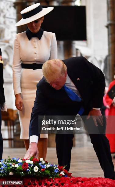 President Donald Trump and First Lady Melania Trump pay their respects at the Tomb of the Unknown Warrior in Westminster Abbey on June 3, 2019 in...