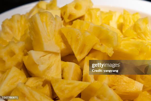 fresh pineapple cube slices isolated - pineapple halved stock pictures, royalty-free photos & images