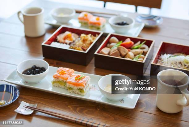 new year dishes. - osechi ryori stock pictures, royalty-free photos & images