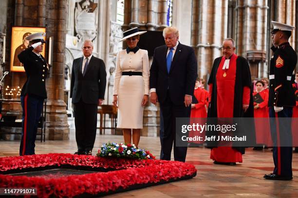 President Donald Trump and First Lady Melania Trump, alongside Prince Andrew, Duke of York pay their respects at the Tomb of the Unknown Warrior in...