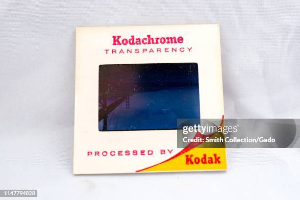 Close-up of a Kodak Kodachrome 35mm film slide isolated on a white background, with Processed by Kodak text, 1970.