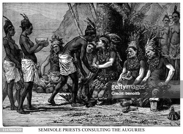 seminole priests consulting the auguries - seminole stock illustrations