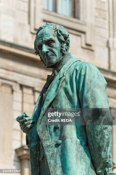 San Fedele square and statue of Alessandro Manzoni. Milan. Lombardy. Italy.