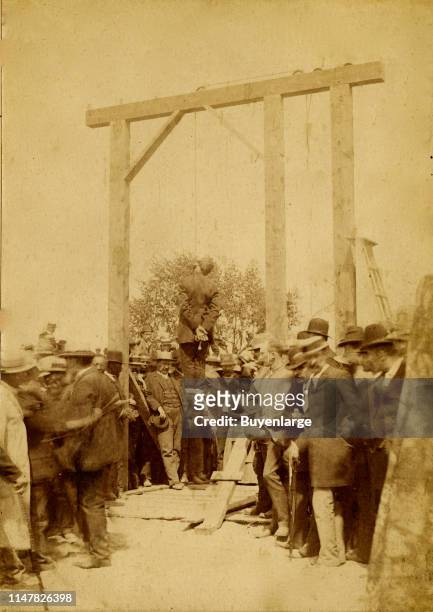 Hanged Man - A Large Group Of Men And At Least One Woman Surrounding The Gallows Where The Dead Man Hangs. Denver Hanging In 1887.