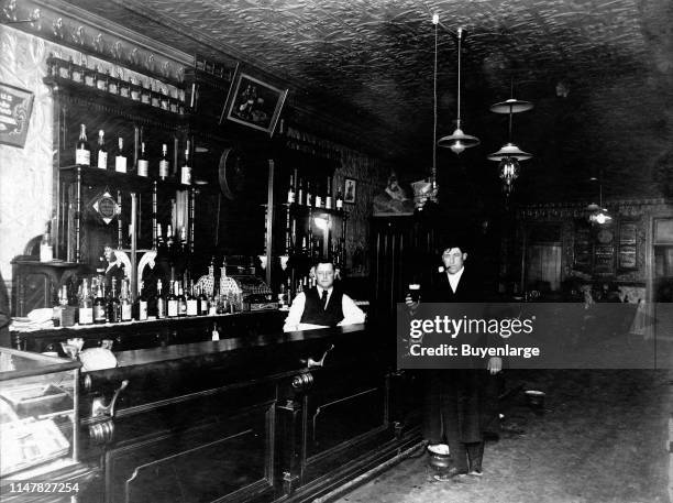 Saloon Ca 1890S. Large Size Photograph Of Saloon, Has Very Nice Front & Back-Bar, Couple Of Spittoons On Floor. There Are Some Great Signs In Saloon...
