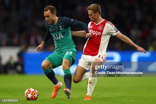 Christian Eriksen of Tottenham Hotspur is challenged by Frenkie de Jong of Ajax during the UEFA Champions League Semi Final second leg match between...