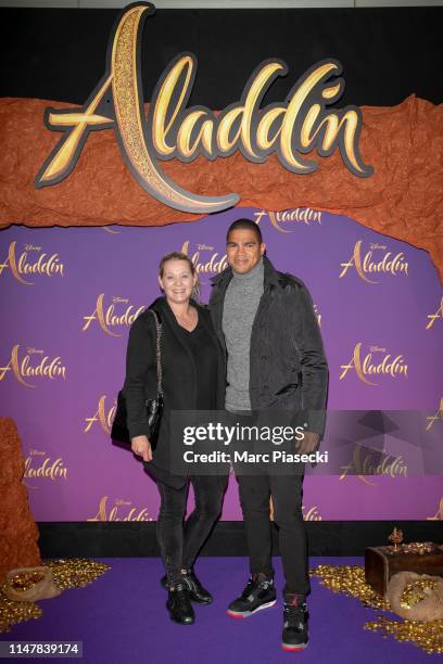 Emmanuelle Narcisse and Daniel Narcisse attend the “Aladdin” Paris Gala Screening at Cinema Le Grand Rex on May 08, 2019 in Paris, France.