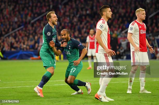 Lucas Moura of Tottenham Hotspur celebrates with Christian Eriksen of Tottenham Hotspur after he scores his sides second goal during the UEFA...