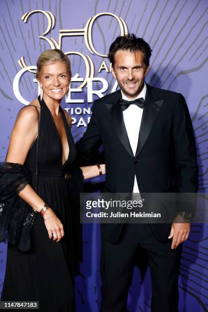 Yannick Bollore and his wife attend the 350th Anniversary Gala : Photocall At Opera Garnieron May 08, 2019 in Paris, France.