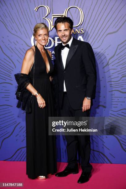 Yannick Bollore and his wife attend the 350th Anniversary Gala : Photocall At Opera Garnieron May 08, 2019 in Paris, France.