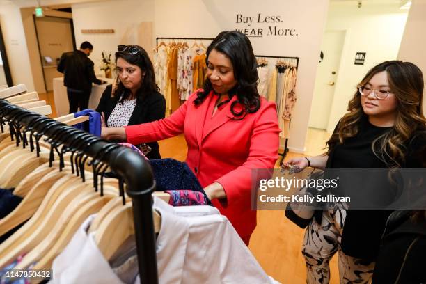 San Francisco Mayor London Breed looks through racks during the launch of Rent the Runway's West Coast flagship store on May 08, 2019 in San...