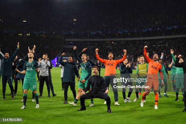 Mauricio Pochettino, Manager of Tottenham Hotspur celebrates victory with his team after the UEFA Champions League Semi Final second leg match...