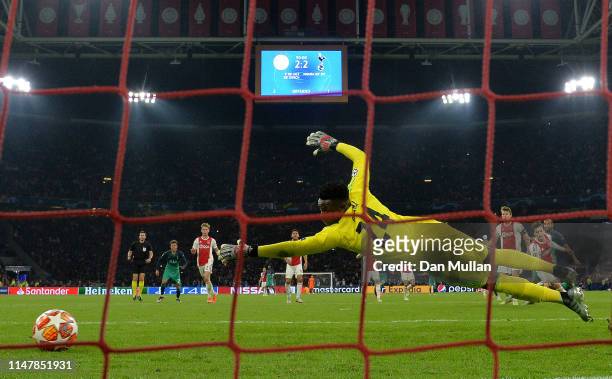 Andre Onana of Ajax dives as Lucas Moura of Tottenham Hotspur scores his team's third goal during the UEFA Champions League Semi Final second leg...