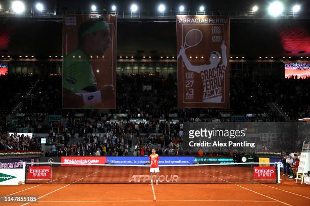 David Ferrer of Spain takes in the moment as the stadium applaud his last ever match during day five of the Mutua Madrid Open at La Caja Magica on...