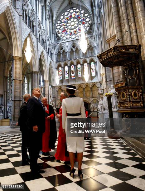 President Donald Trump and First Lady Melania Trump are accompanied by Prince Andrew, Duke of York and the Dean of Westminster, John Hall during a...