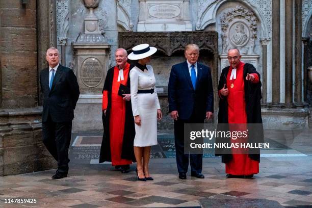 President Donald Trump and US First Lady Melania Trump are shown around Westminster Abbey by the Dean of Westminster, John Hall , and accompanied by...