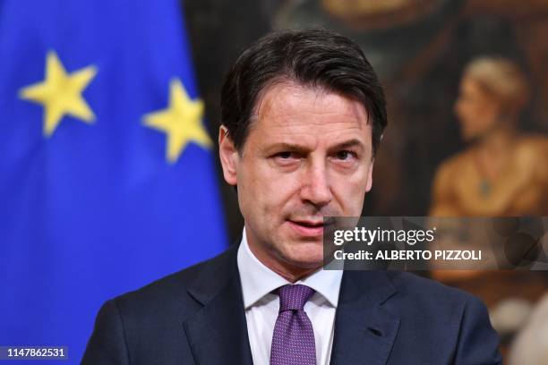 Italian Prime Minister Giuseppe Conte looks on during a press conference at Chigi Palace in Rome on June 3, 2019.