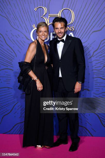 Yannick Bollore and his wife attend the 350th Anniversary Gala photocall at Opera Garnier on May 08, 2019 in Paris, France.