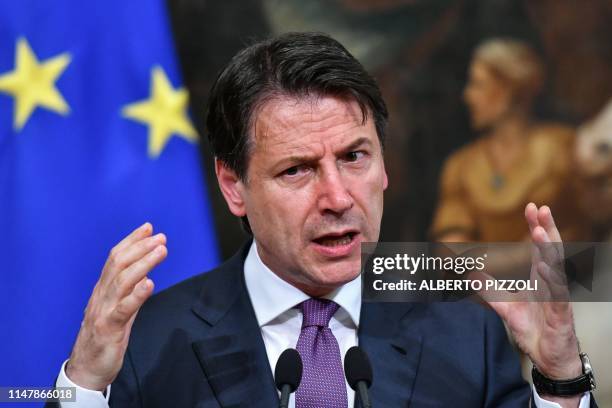 Italian Prime Minister Giuseppe Conte gestures as he speaks during a press conference at Chigi Palace in Rome on June 3, 2019.