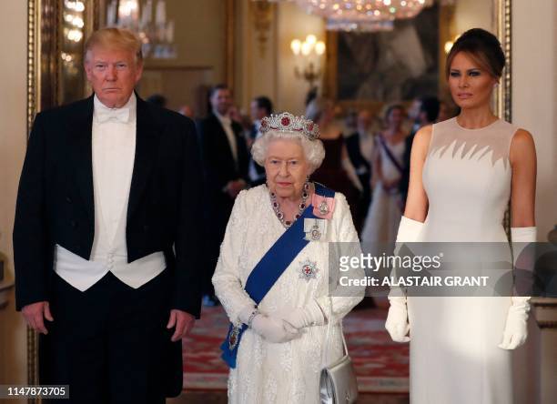Britain's Queen Elizabeth II , US President Donald Trump , and US First Lady Melania Trump pose for a photograph ahead of a State Banquet in the...