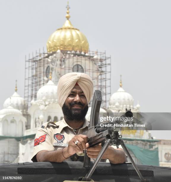 Security personnel stand guard ahead of the 35th Operation Blue Star anniversary, at Golden Temple on June 3, 2019 in Amritsar, India. Security was...