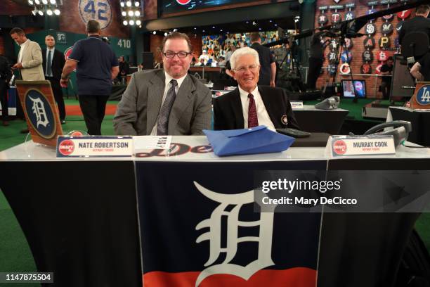 Detroit Tigers team reps Brandon Inge and Murray Cook pose for a photo prior to the 2019 Major League Baseball Draft at Studio 42 at the MLB Network...