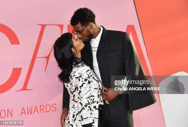 Singer Teyana Taylor and her husband pro-basketball player Iman Shumpert arrive for the 2019 CFDA fashion awards at the Brooklyn Museum in New York...