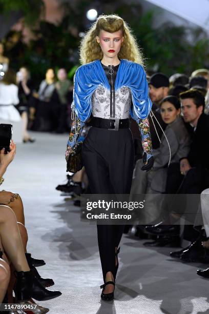 Model walks the runway during Louis Vuitton Cruise 2020 on May 8, 2019 in New York, USA.