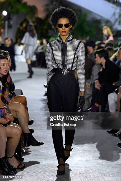 Model walks the runway during Louis Vuitton Cruise 2020 on May 8, 2019 in New York, USA.