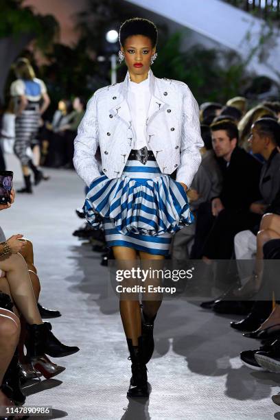 Model walks the runway during Louis Vuitton Cruise 2020 on May 8, 2019 in New York, USA.