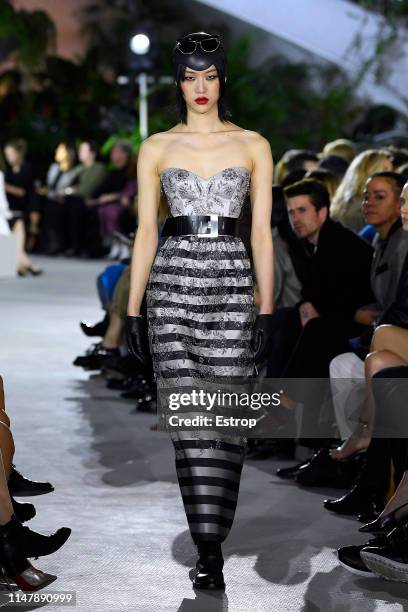 Model walks the runway during Louis Vuitton Cruise 2020 on May 8, 2019 in New York, USA.