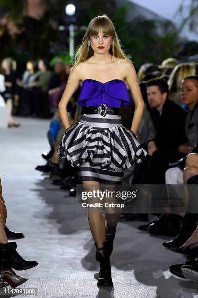 Model walks the runway during Louis Vuitton Cruise 2020 on May 8, 2019 in New York, USA.