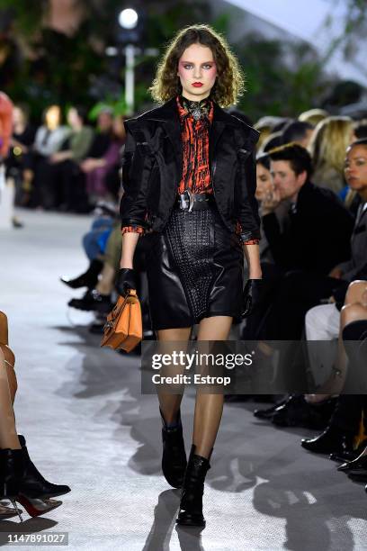 Model walks the runway during Louis Vuitton Cruise 2020 on May 8, 2019 in New York, USA.