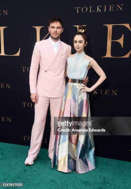Nicholas Hoult and Lily Collins arrive at the LA Special Screening of Fox Searchlight Pictures' "Tolkien" at the Regency Village Theatre on May 08,...