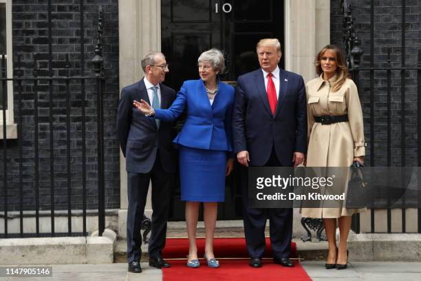 Philip May, British Prime Minister Theresa May, US President Donald Trump and First Lady Melania Trump arrive at 10 Downing street for a meeting on...