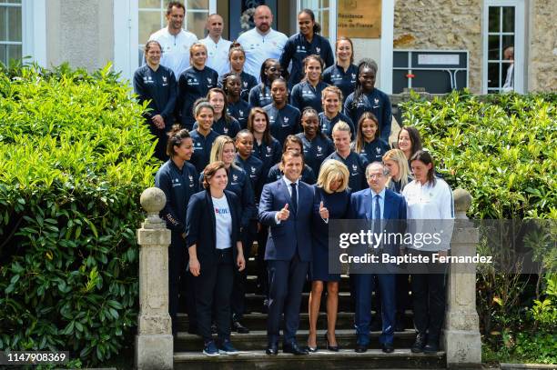 French Women team pose with French President Emmanuel Macron and Brigitte Macron visit the French women soccer team before the FIFA Women World Cup...