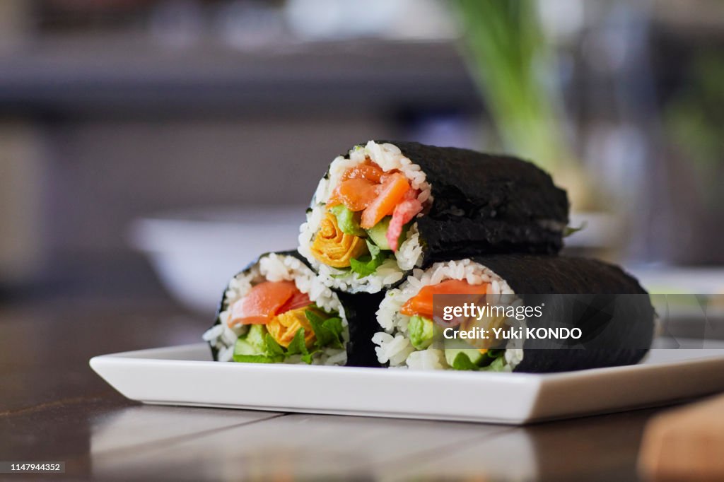 Rice roll wrapped in a plate.