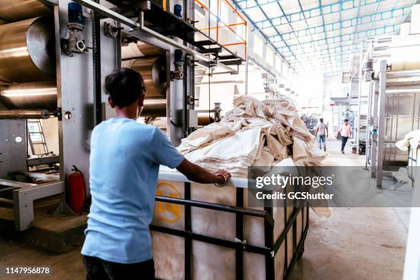 textile industry in india - indian industrial growth stock pictures, royalty-free photos & images