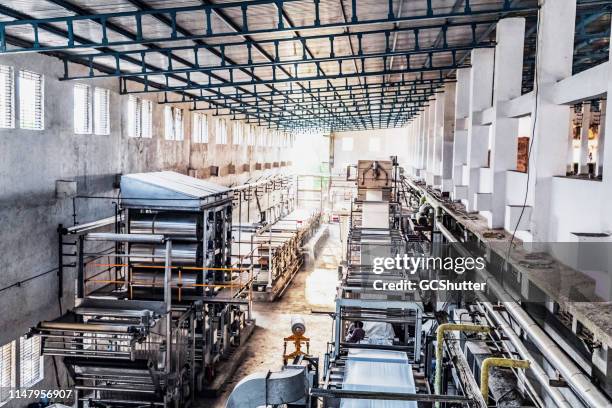 large textile industry factory - indian textile factory stock pictures, royalty-free photos & images