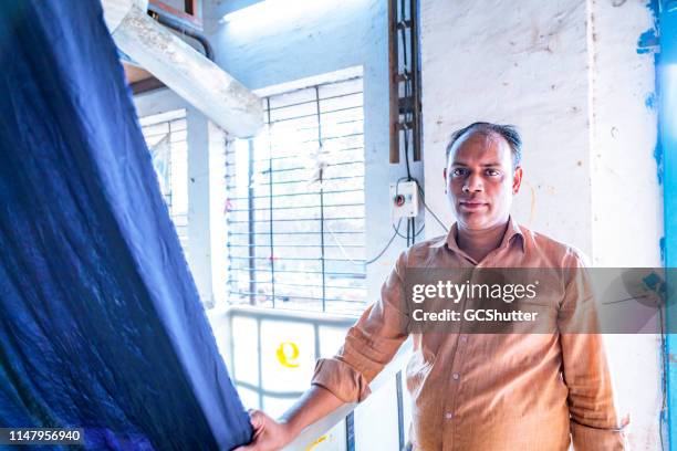 portrait of an indian factory worker - mumbai daily life stock pictures, royalty-free photos & images