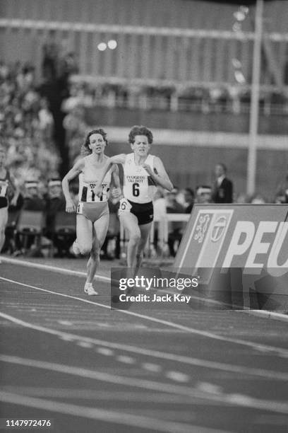 South-African middle-distance and long-distance runner Zola Budd running barefoot on her way to a women's 2000 metres world record time of 5 minutes...